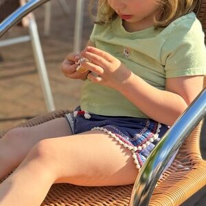 Mini Boden Pom Trim Jersey Shorts in Soft Starboard Blue (Size 3Y)